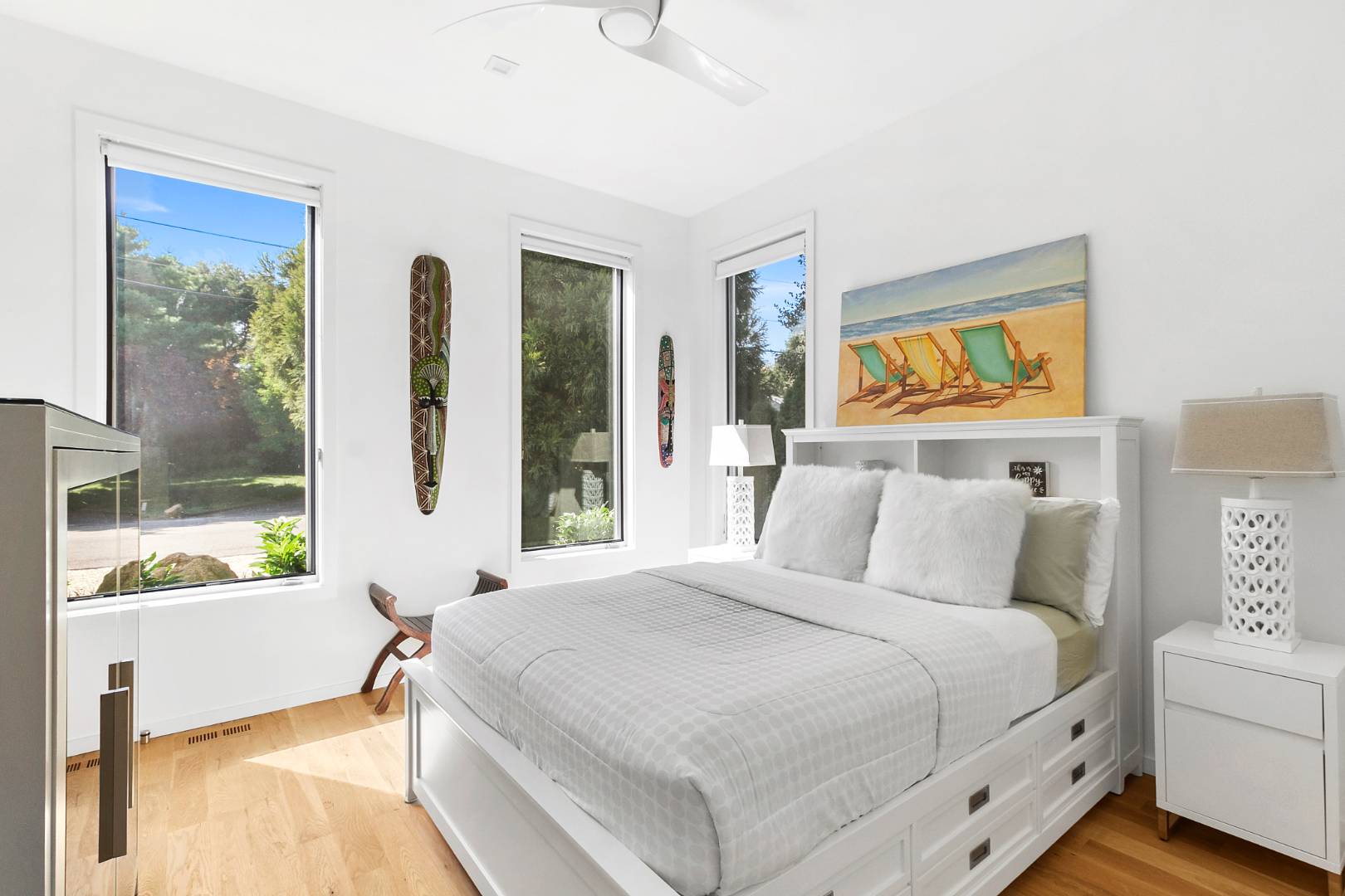 43 Harbor Drive Sag Harbor, NY 11963 - Photo 22 of 29 a bedroom with a large bed and a window