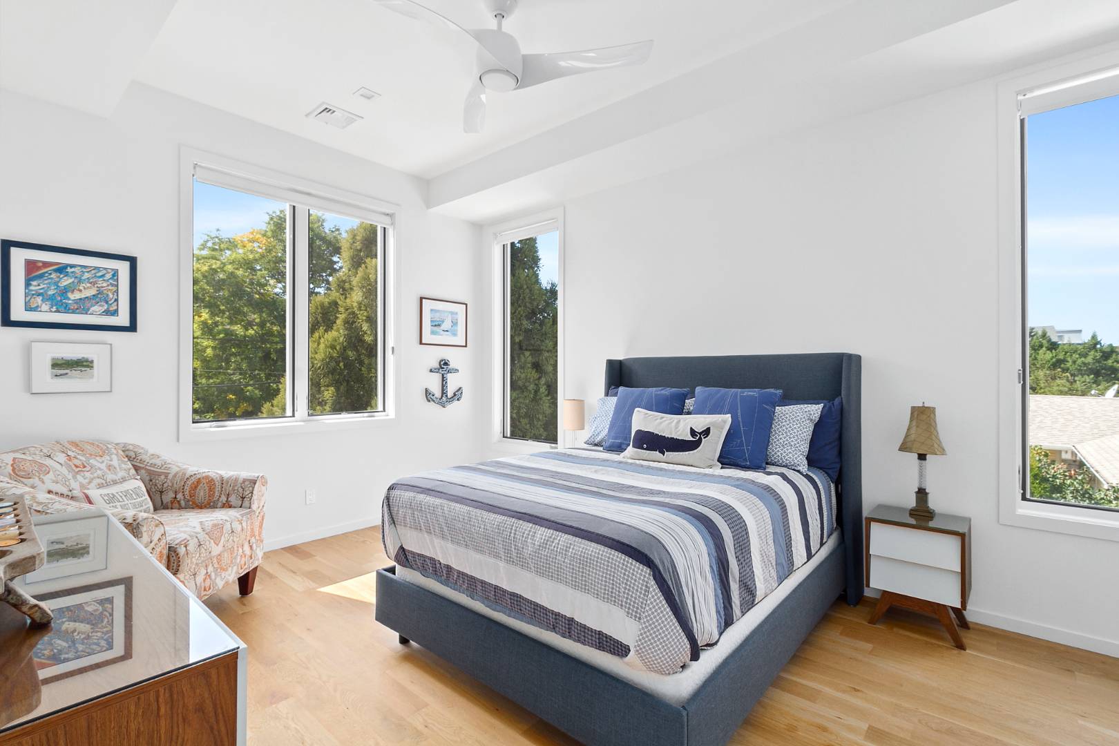 43 Harbor Drive Sag Harbor, NY 11963 - Photo 27 of 29 a bedroom with a bed and a large window