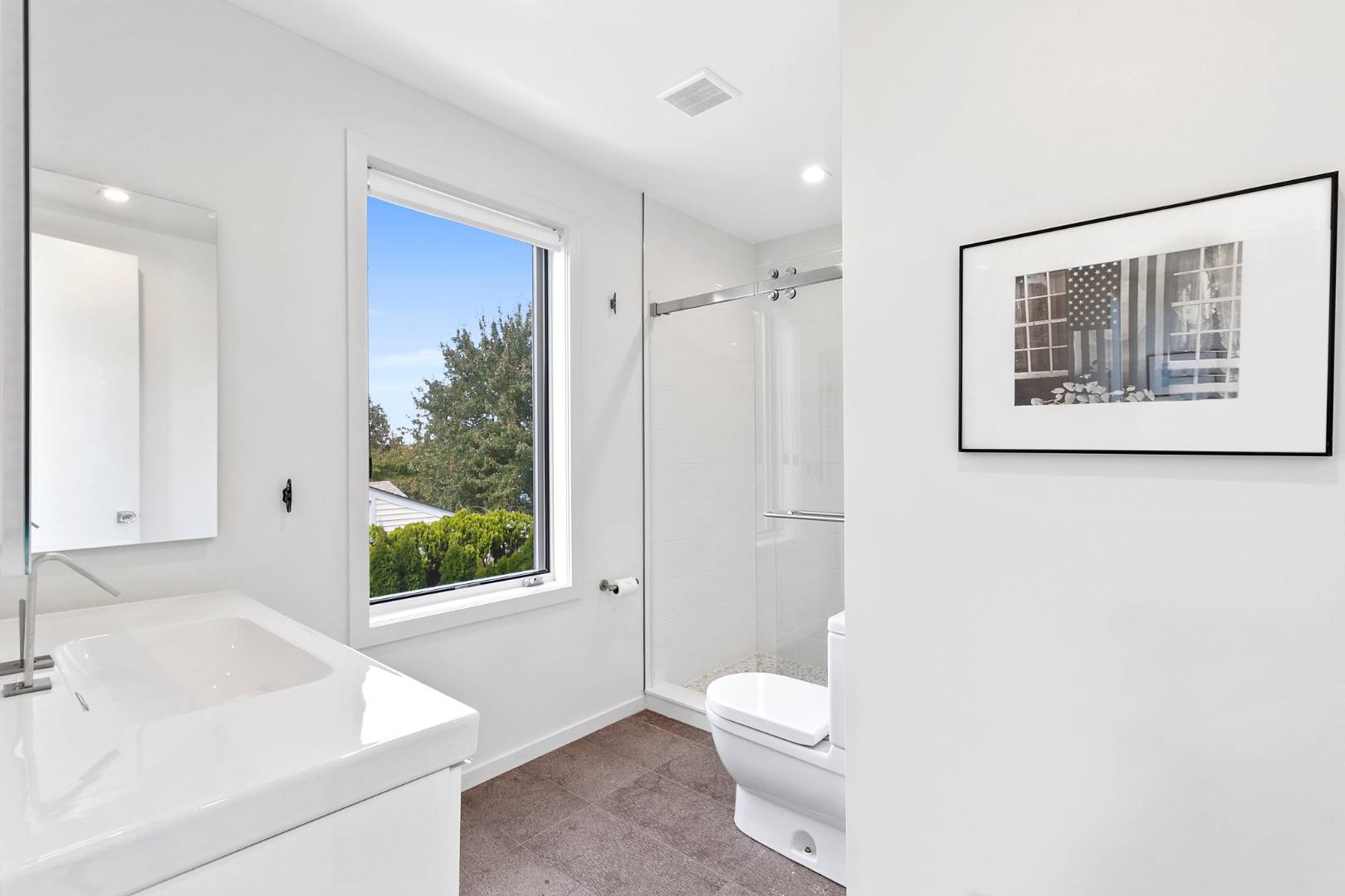 43 Harbor Drive Sag Harbor, NY 11963 - Photo 28 of 29 a bathroom with a sink a toilet and shower