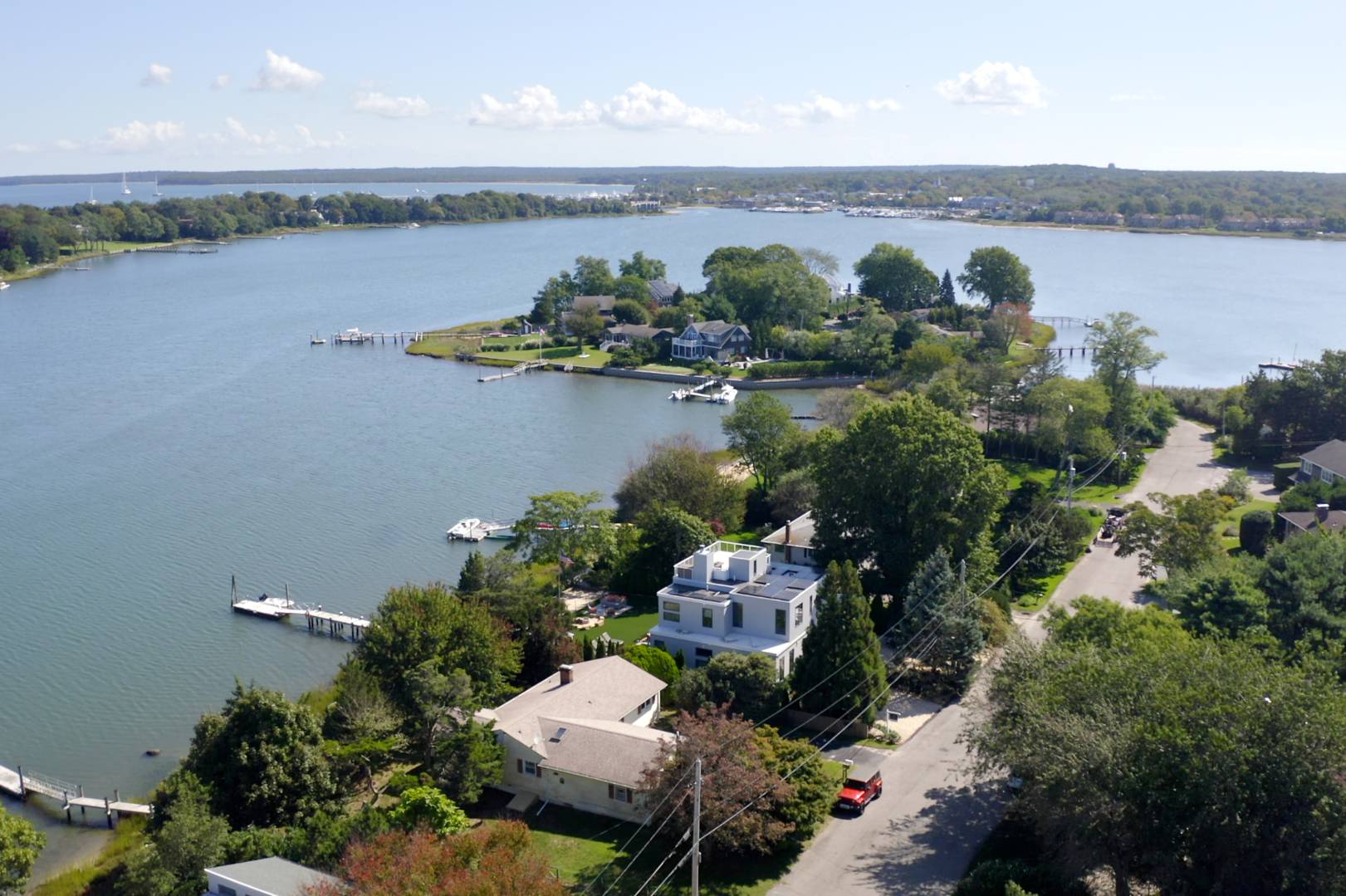 43 Harbor Drive Sag Harbor, NY 11963 - Photo 4 of 29 an aerial view of a house with a yard and lake view