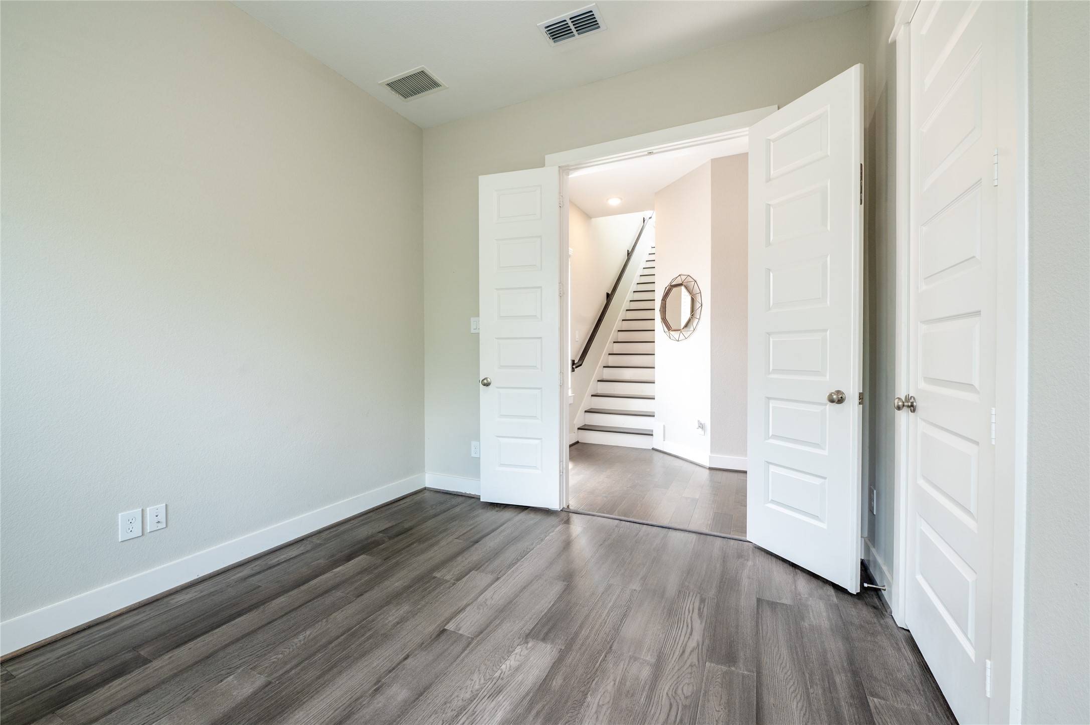 963 Lilly Flower Lane Houston, TX 77091 - Photo 8 of 28 First floor office/secondary bedroom with double doors