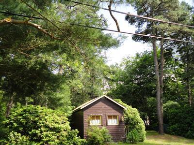 86 Old Farm Road Centerville, MA 02632 - Photo 1 of 10 a front view of a house with a yard and garage