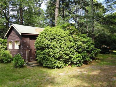 86 Old Farm Road Centerville, MA 02632 - Photo 3 of 10 a view of a house with a tree