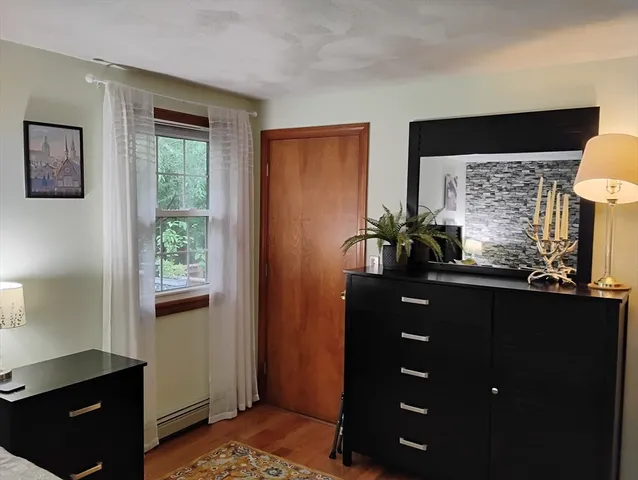 a white toilet sitting next to a small bathroom