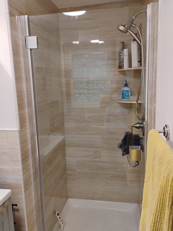 9 Packard Road Milford, MA 01757 - Photo 14 of 30 a bathroom with a shower