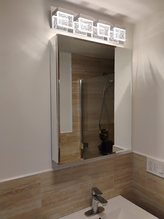 9 Packard Road Milford, MA 01757 - Photo 15 of 30 a bathroom with a sink