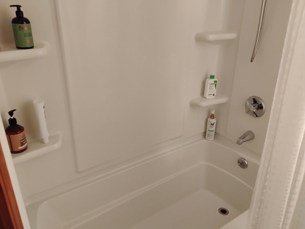 9 Packard Road Milford, MA 01757 - Photo 22 of 30 a close up of a bathtub