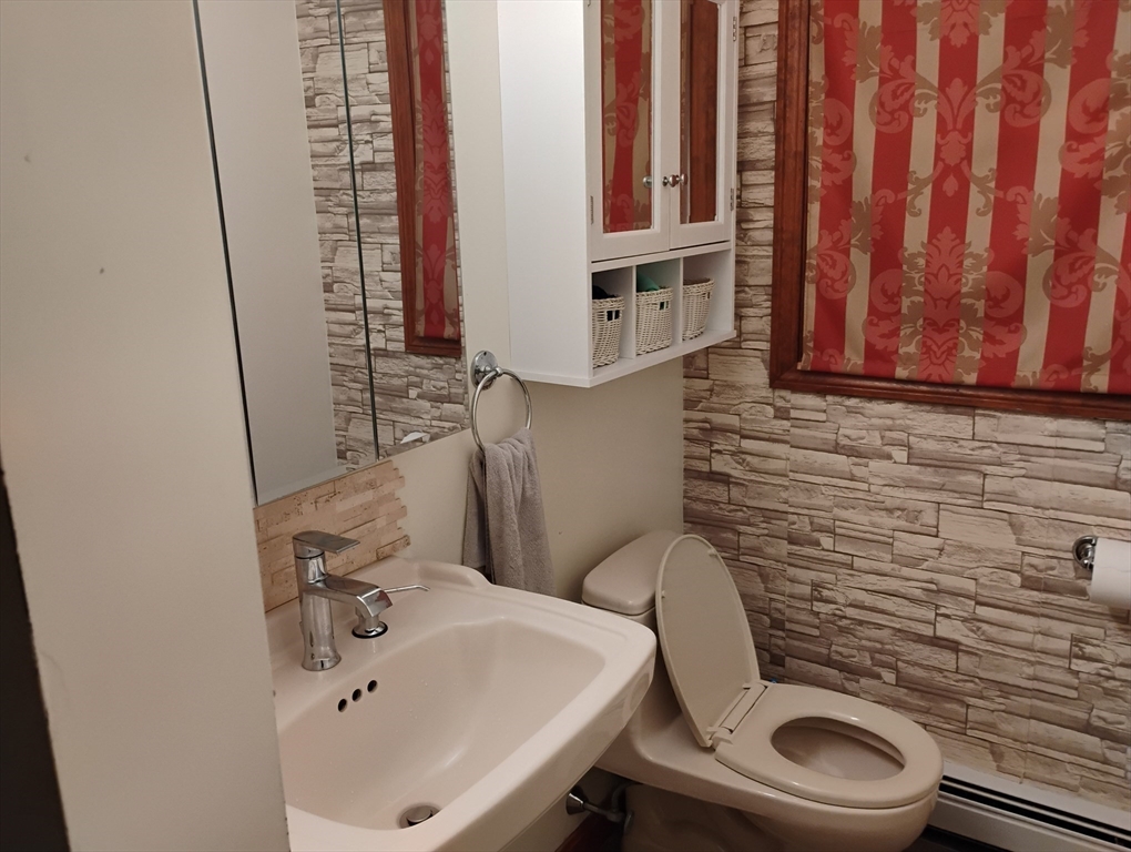 9 Packard Road Milford, MA 01757 - Photo 23 of 30 a bathroom with a sink and a toilet