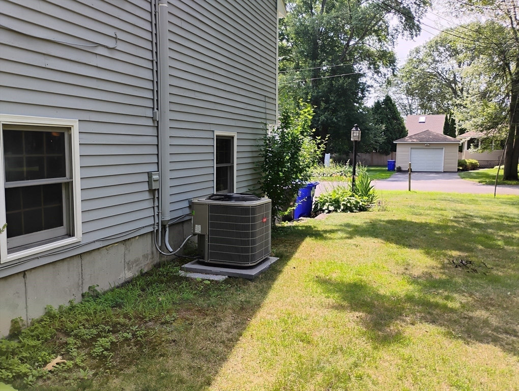 9 Packard Road Milford, MA 01757 - Photo 25 of 30 a house view with a backyard space