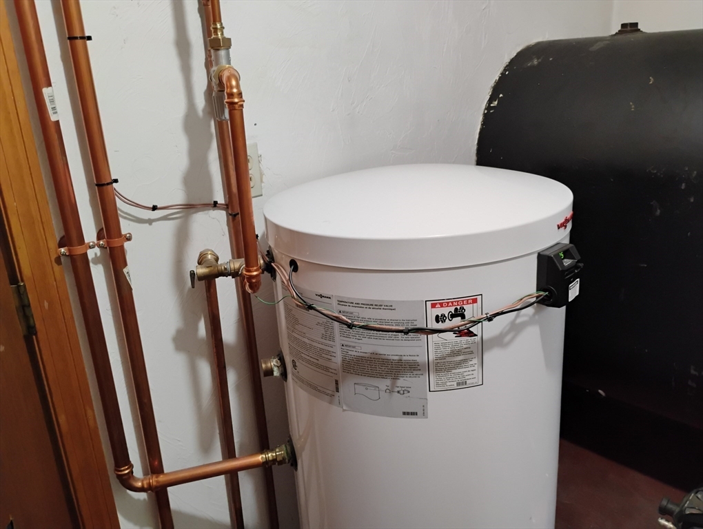 9 Packard Road Milford, MA 01757 - Photo 26 of 29 a bathroom with a toilet and a sink