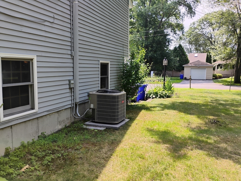 9 Packard Road Milford, MA 01757 - Photo 27 of 29 a house view with a backyard space