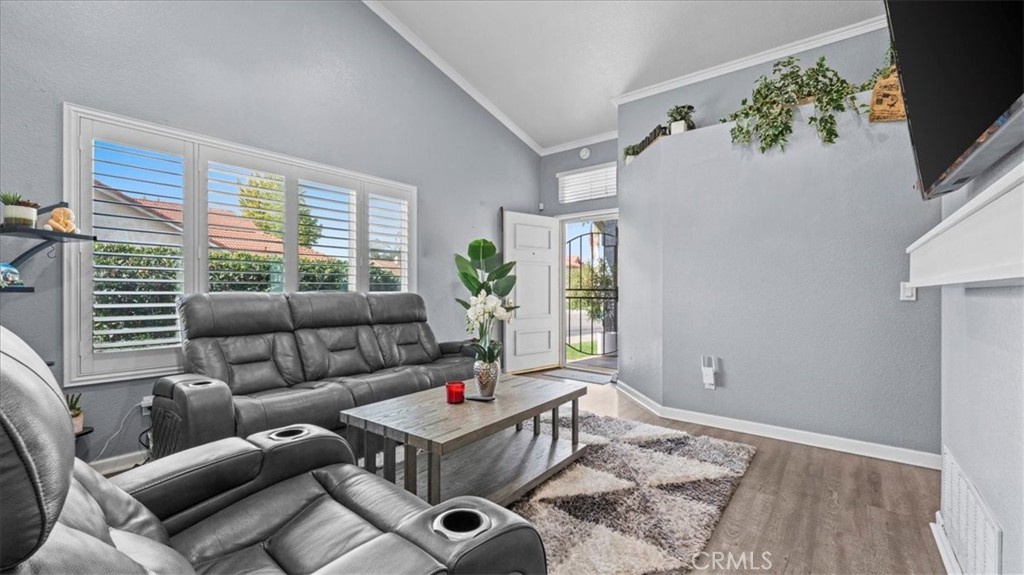 12846 Mayflower Court Riverside, CA 92503 - Photo 11 of 32 a living room with furniture and a flat screen tv