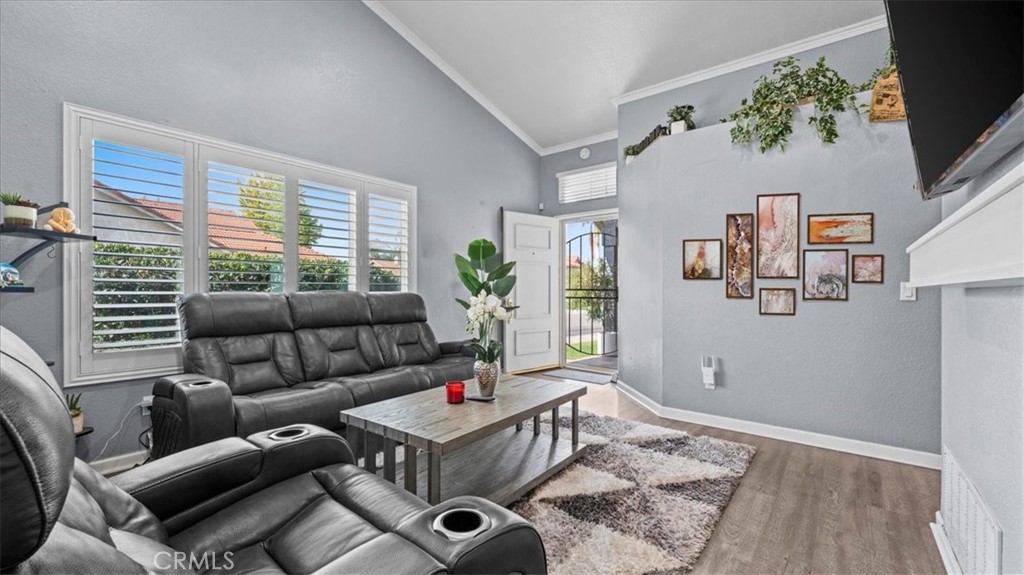 12846 Mayflower Court Riverside, CA 92503 - Photo 12 of 32 a living room with furniture and a flat screen tv