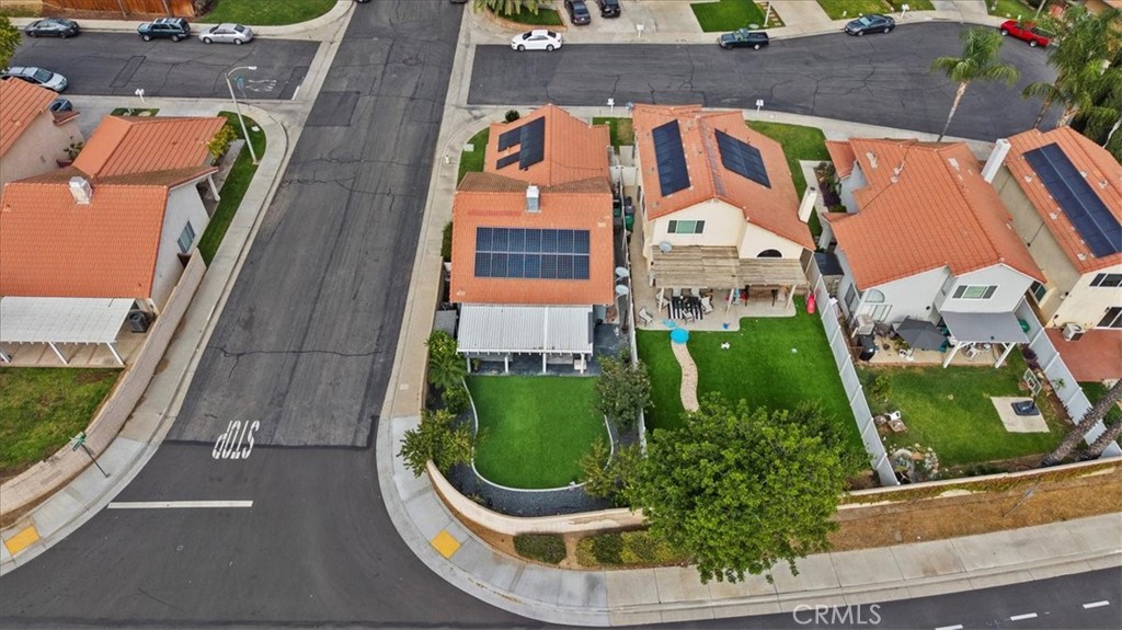 12846 Mayflower Court Riverside, CA 92503 - Photo 26 of 32 an aerial view of a residential apartment building with a yard