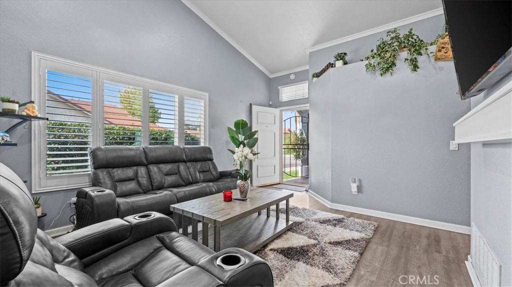 12846 Mayflower Court Riverside, CA 92503 - Photo 32 of 32 a living room with furniture and a flat screen tv