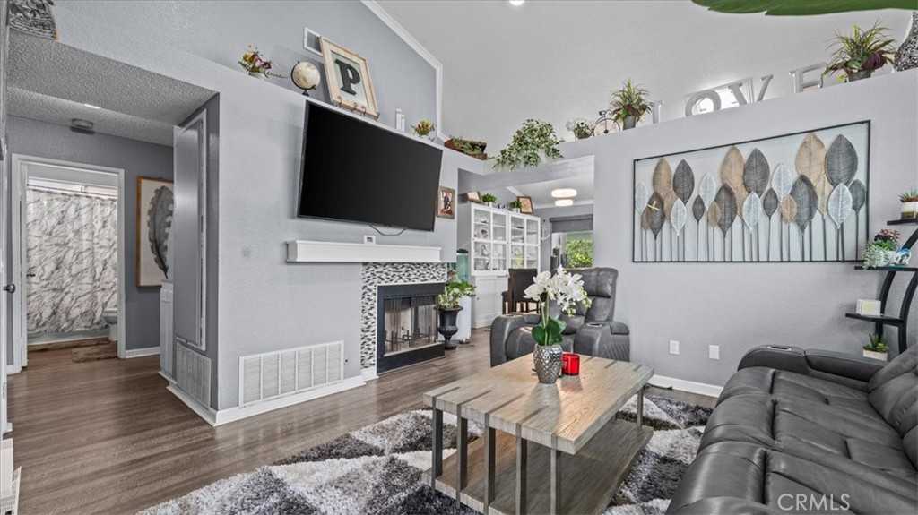 12846 Mayflower Court Riverside, CA 92503 - Photo 10 of 32 a living room with furniture and a flat screen tv