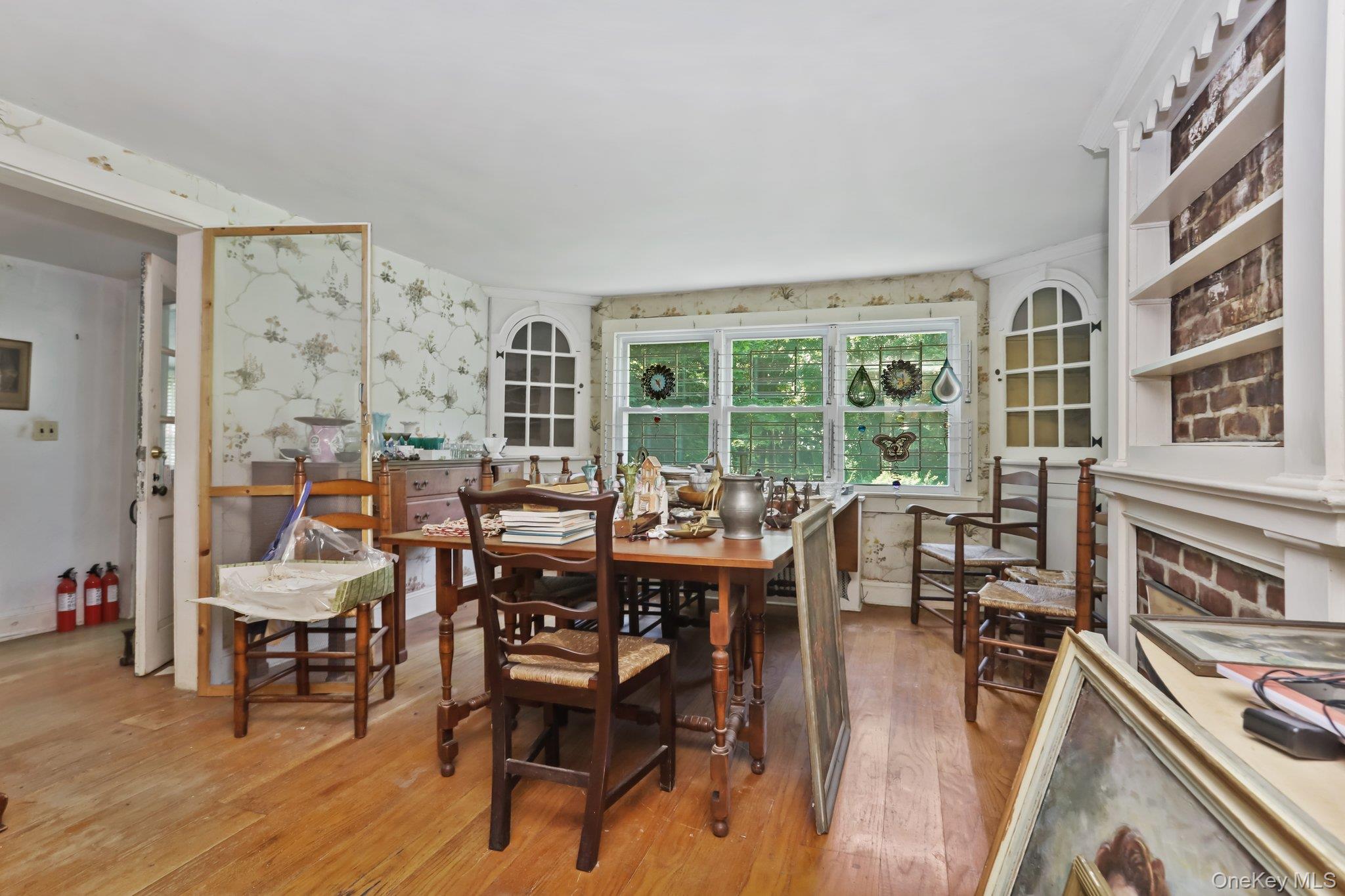 3868 Indian Hill Road Shrub Oak, NY 10588 - Photo 13 of 33 a view of a dining room with furniture window and wooden floor