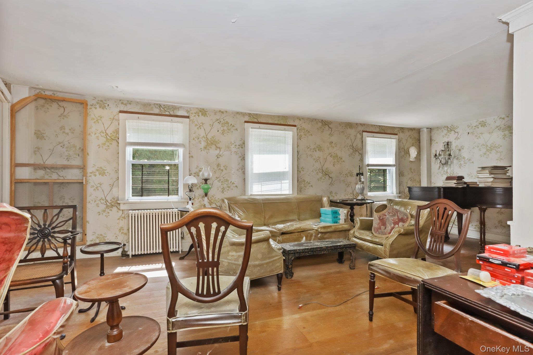 3868 Indian Hill Road Shrub Oak, NY 10588 - Photo 19 of 33 a living room with furniture and a large window