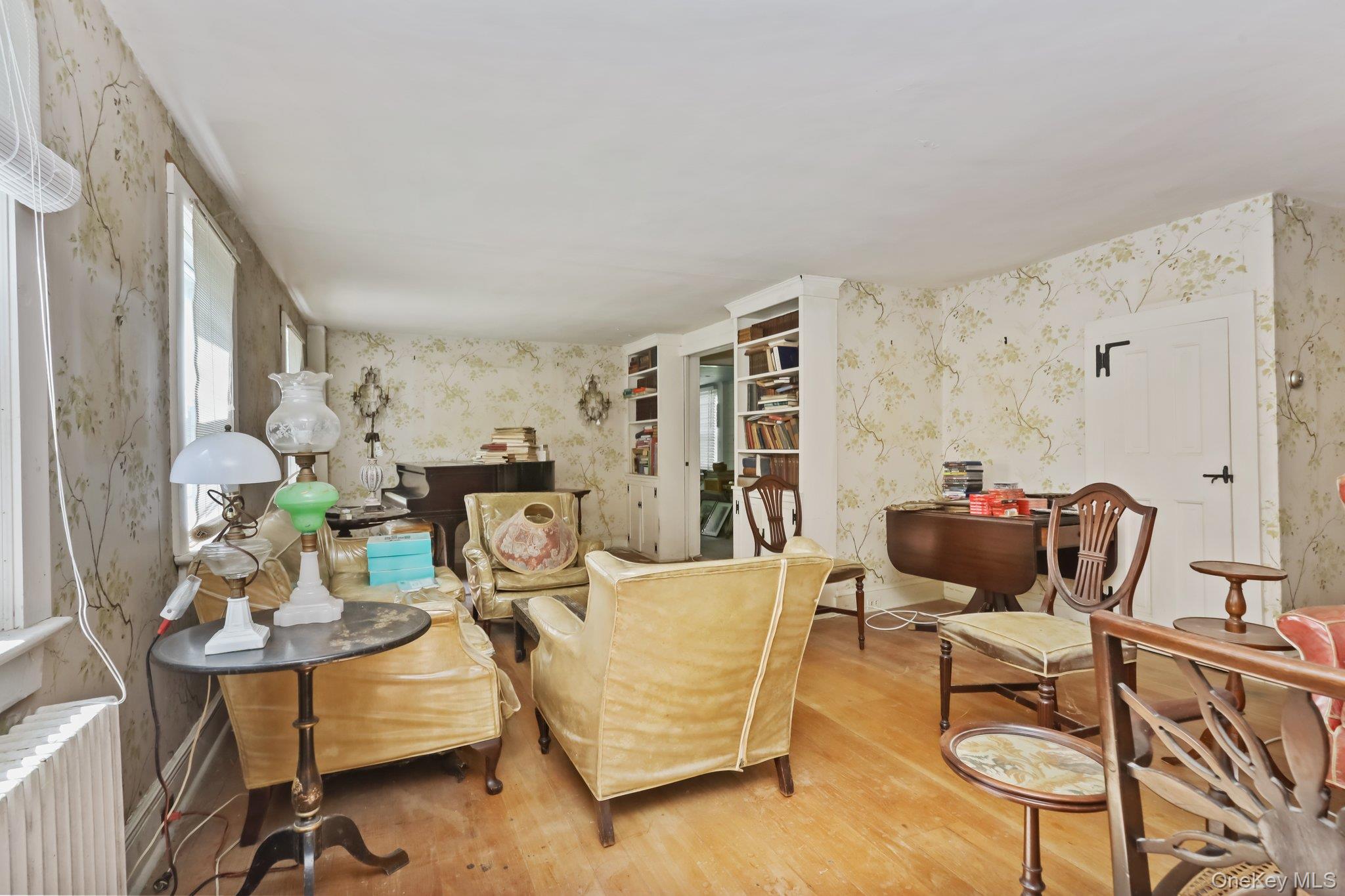 3868 Indian Hill Road Shrub Oak, NY 10588 - Photo 20 of 33 a living room with furniture and wooden floor