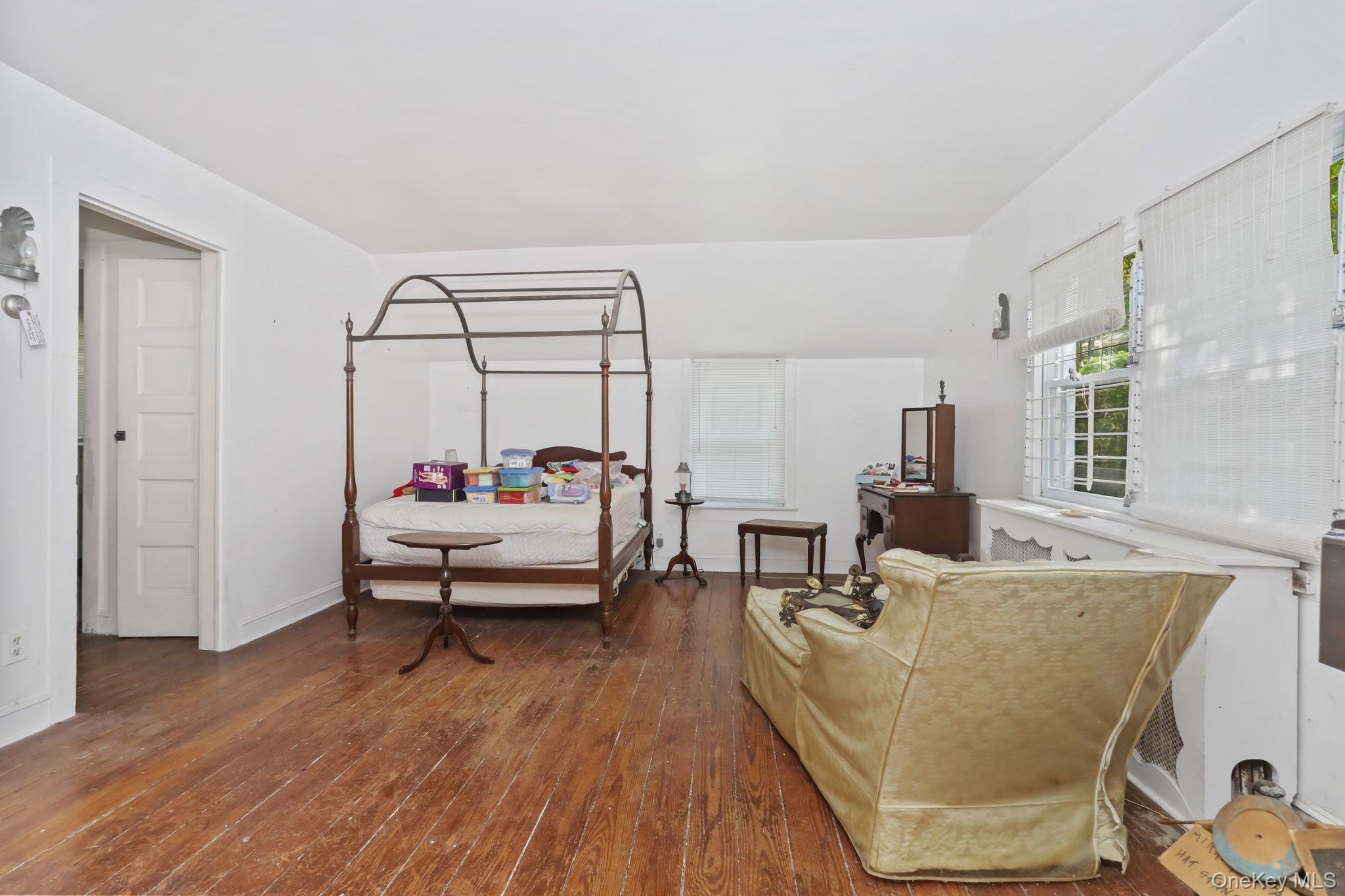 3868 Indian Hill Road Shrub Oak, NY 10588 - Photo 21 of 33 a living room with furniture and a wooden floor