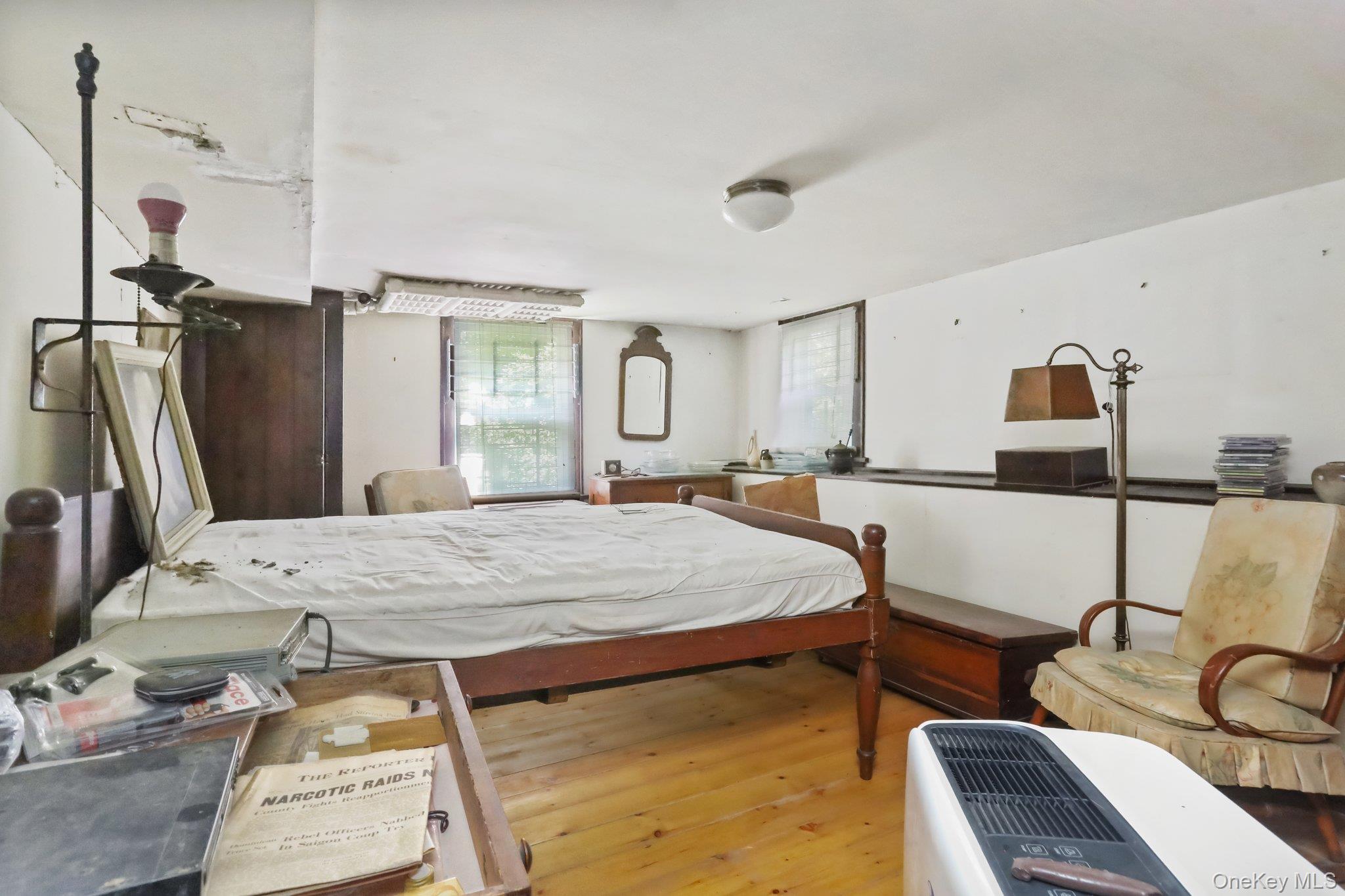 3868 Indian Hill Road Shrub Oak, NY 10588 - Photo 30 of 33 a living room with furniture and a floor to ceiling window