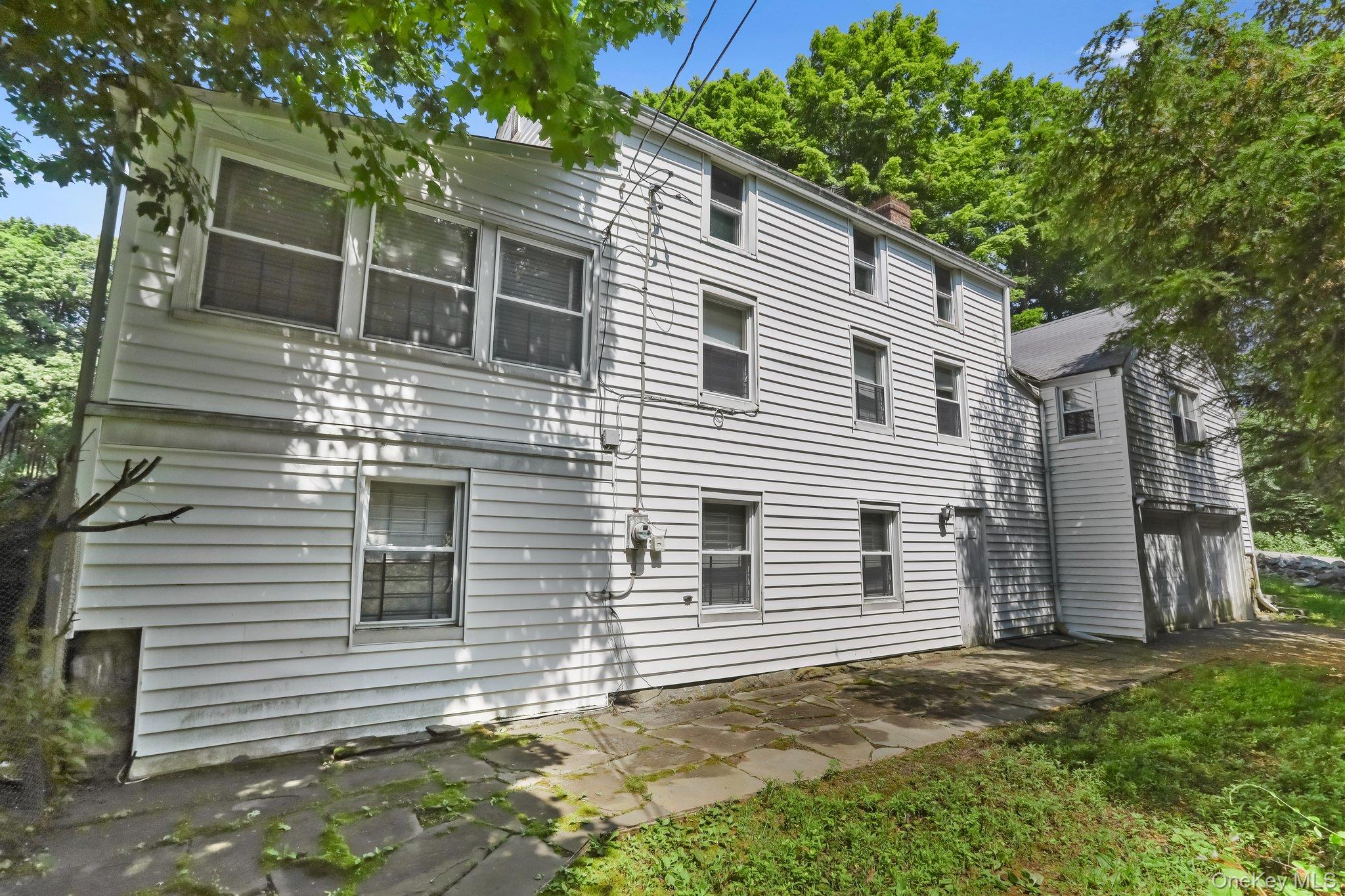 3868 Indian Hill Road Shrub Oak, NY 10588 - Photo 31 of 33 a view of a house with a yard