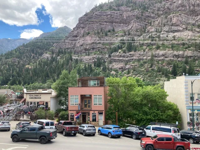 a car parked in front of a building