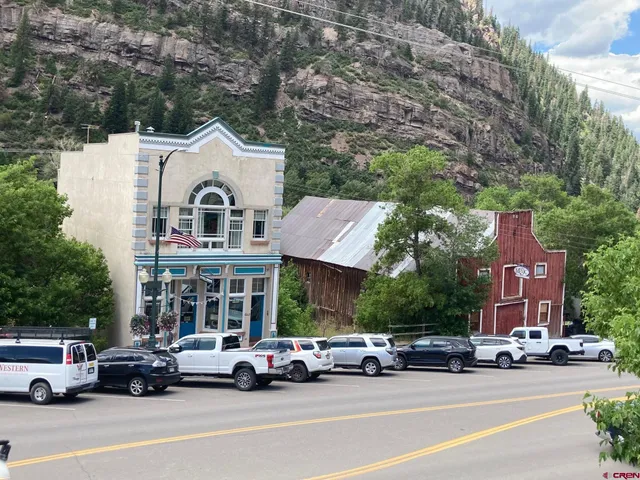 a car parked in front of a building