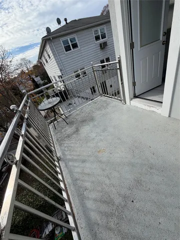 a view of staircase and utility room