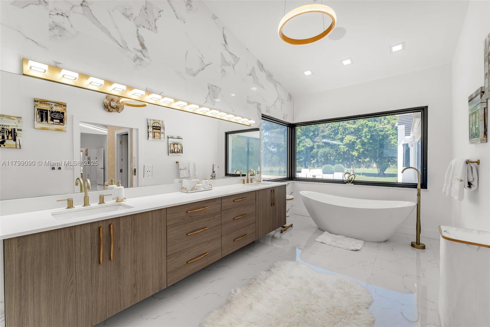 17795 Southwest 158th Street Miami, FL 33187 - Photo 21 of 45 a large bathroom with a large tub sink and window