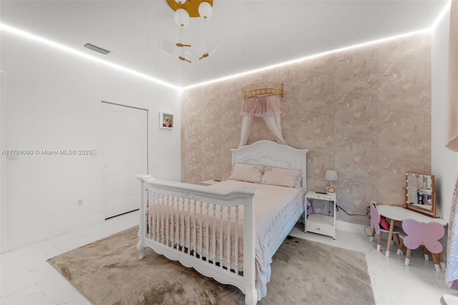 17795 Southwest 158th Street Miami, FL 33187 - Photo 29 of 45 a bed room with a bed and a chair