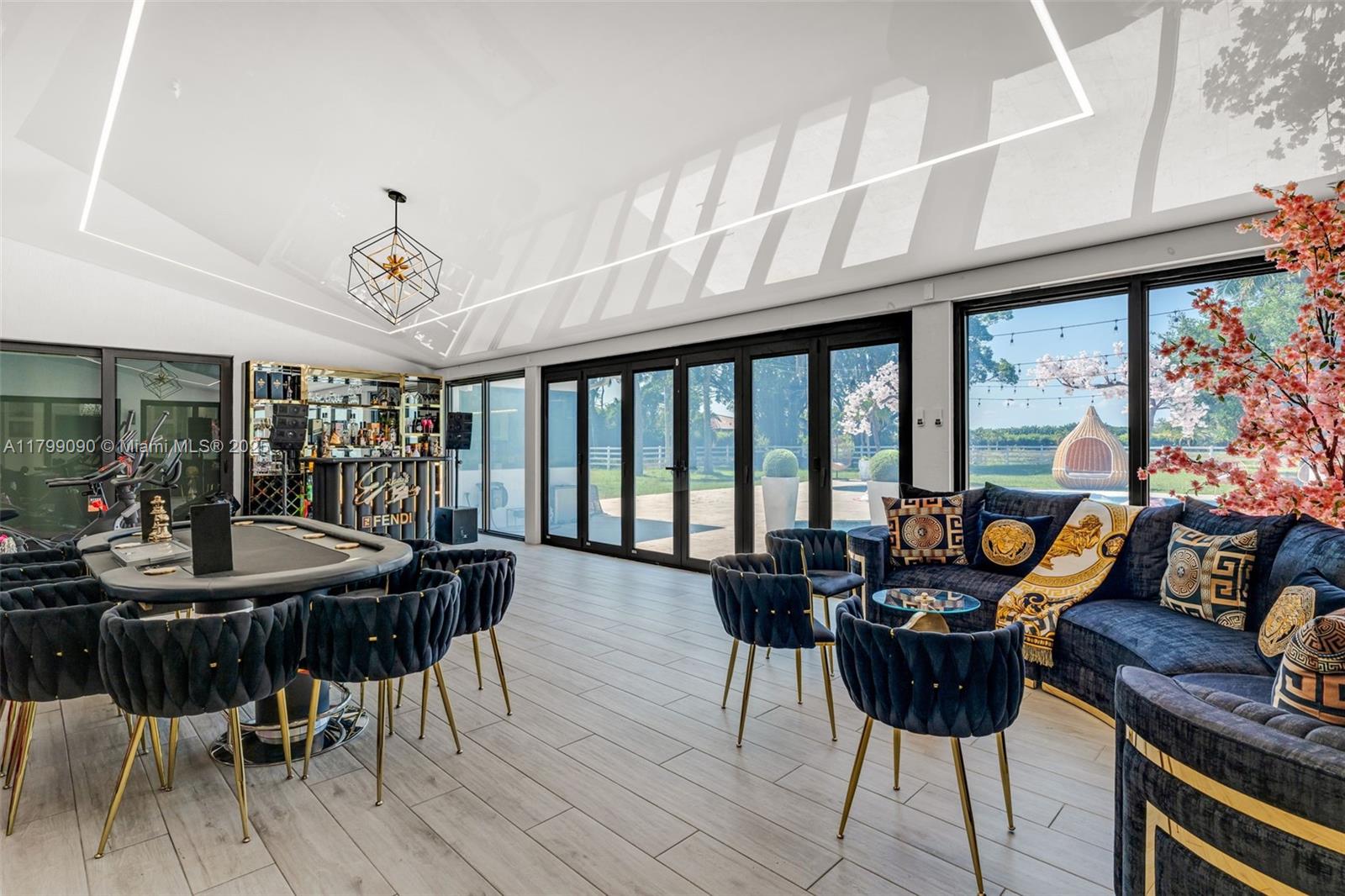 17795 Southwest 158th Street Miami, FL 33187 - Photo 34 of 45 a living room with furniture and a large window