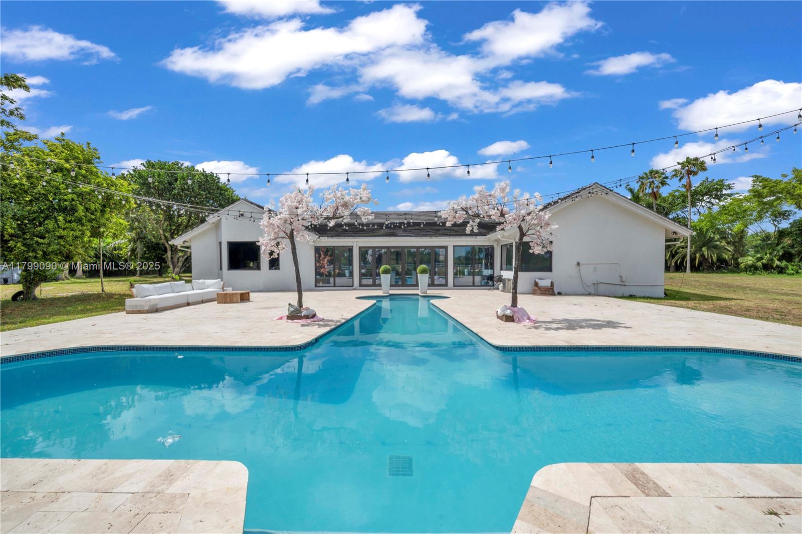 17795 Southwest 158th Street Miami, FL 33187 - Photo 39 of 45 a view of house with swimming pool outdoor seating