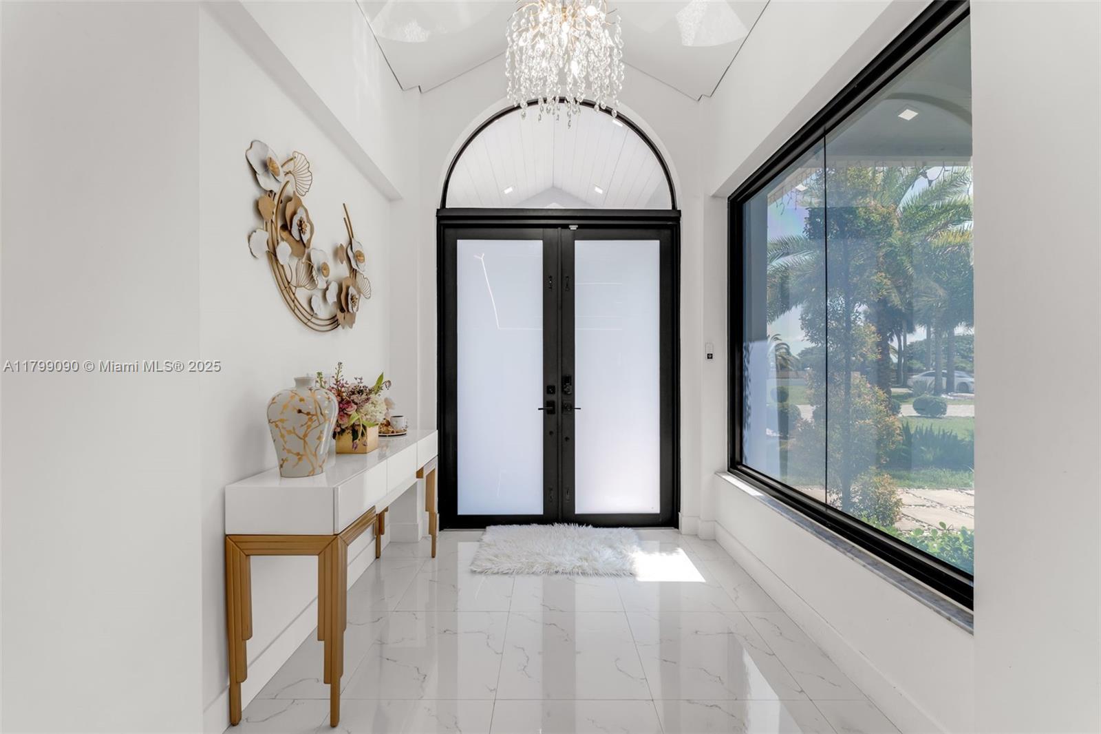17795 Southwest 158th Street Miami, FL 33187 - Photo 5 of 45 a view of a hallway with wooden floor and windows
