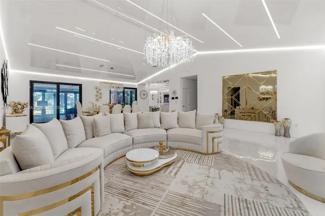 a living room with furniture and a table