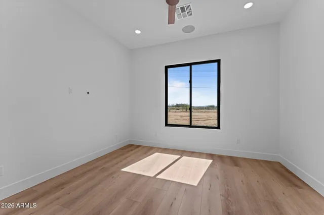 a view of a kitchen with a dishwasher and a refrigerator