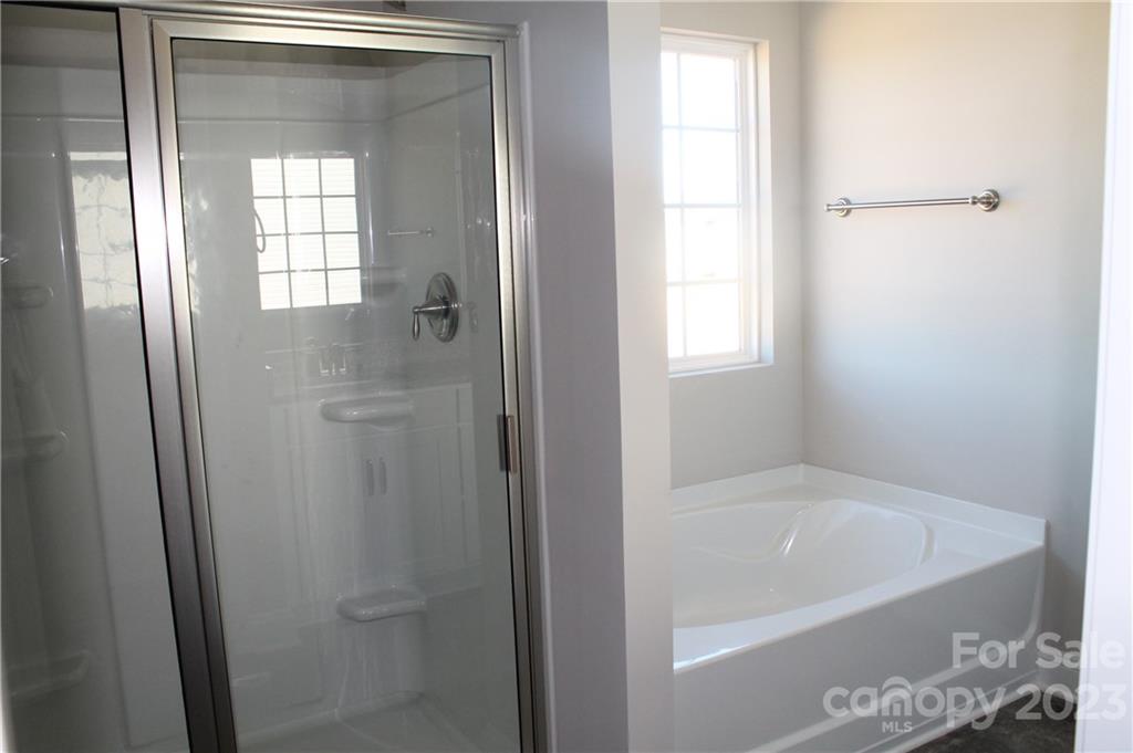 3224 Austin Chaney Road Monroe, NC 28110 - Photo 13 of 23 a bathroom with a bathtub