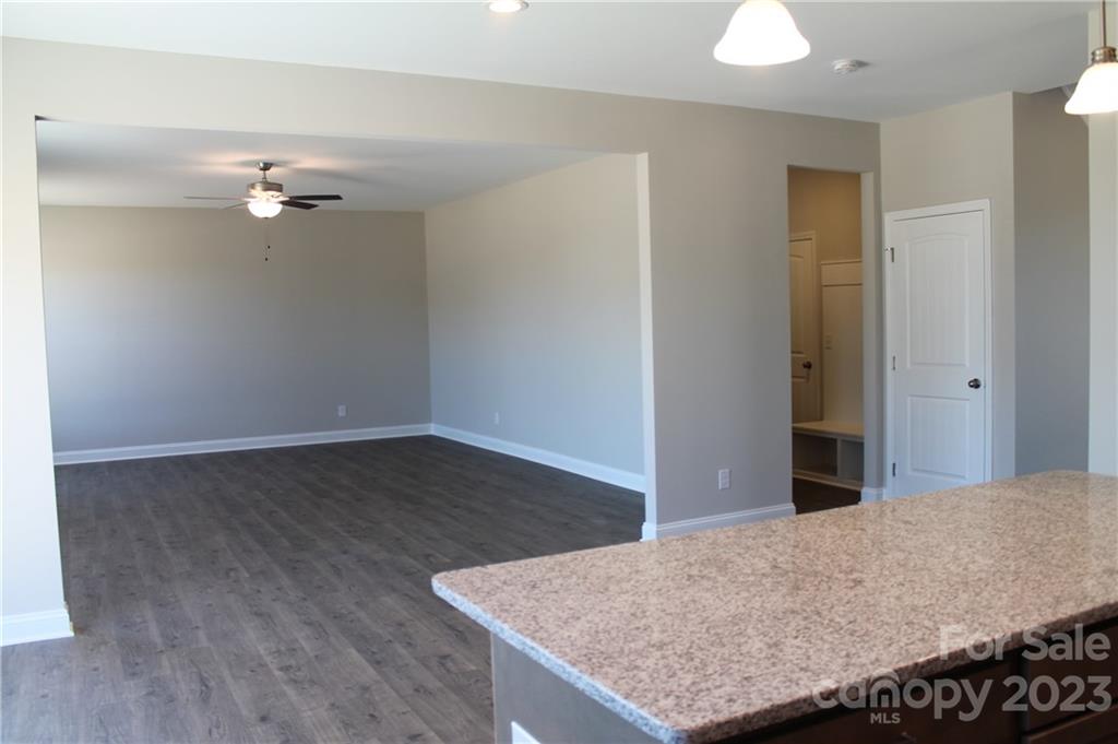 3224 Austin Chaney Road Monroe, NC 28110 - Photo 10 of 23 wooden floor in an empty room