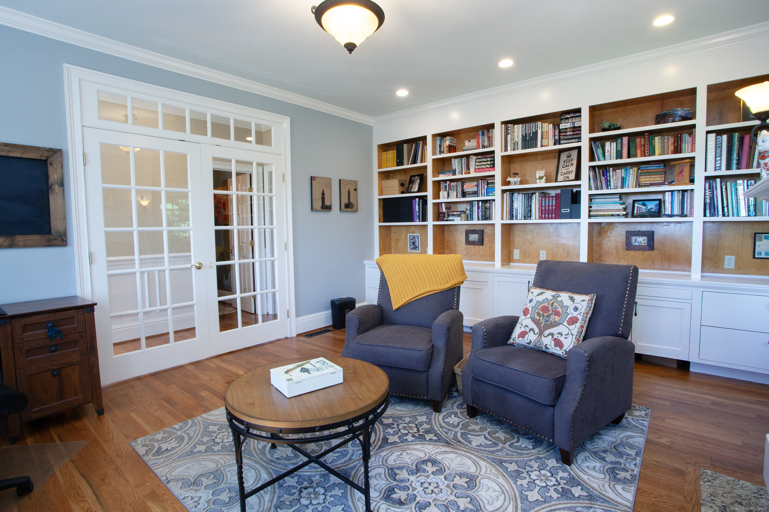 15 Old Orchard Road Granby, CT 06090 - Photo 5 of 32 The office/study has built in bookshelves and cabinetry.