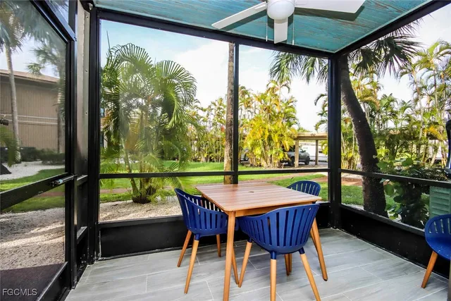a view of an outdoor dining space with furniture