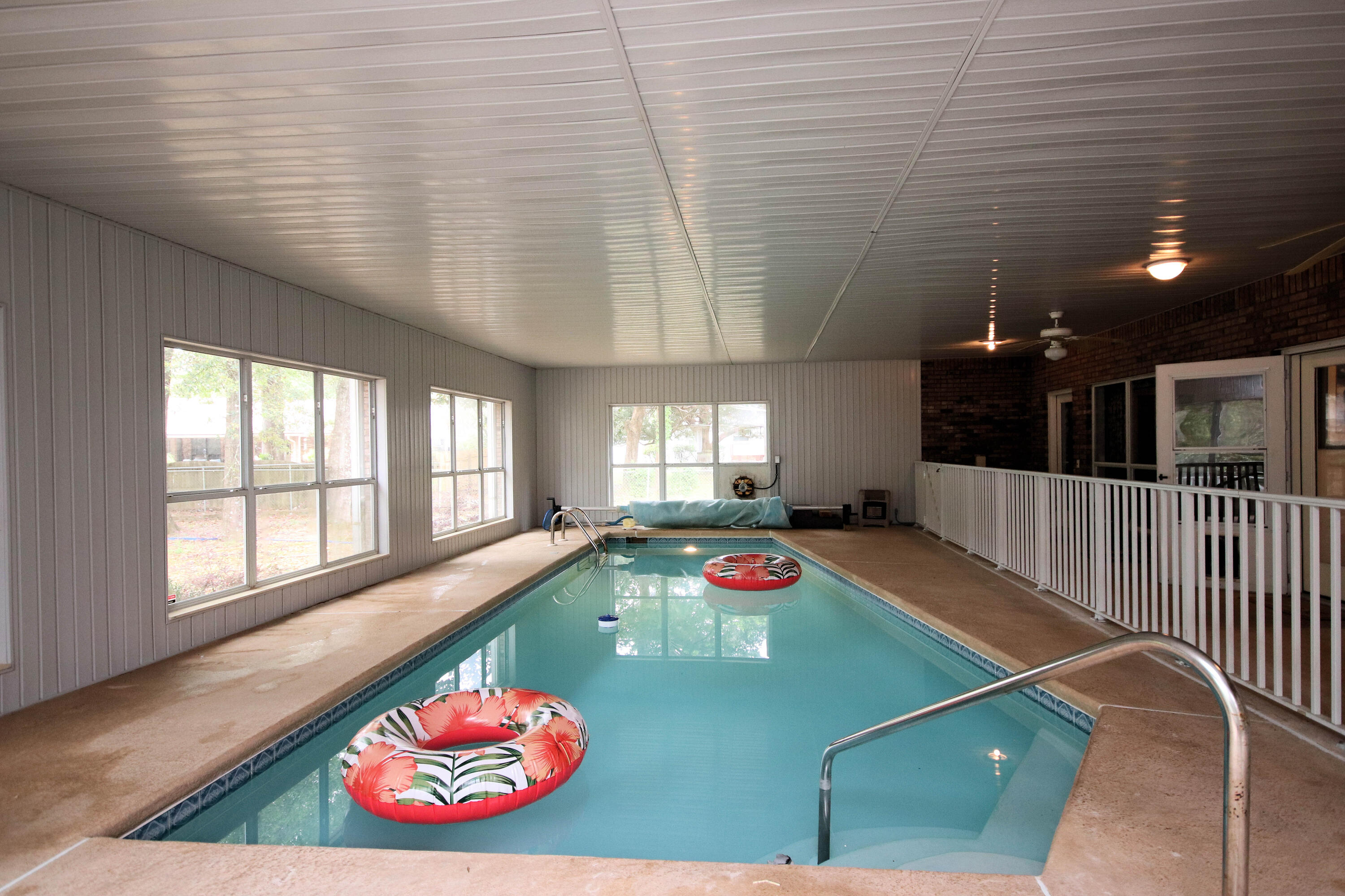 600 Northwest Mooney Road Fort Walton Beach, FL 32547 - Photo 30 of 35 a room with pool table and windows