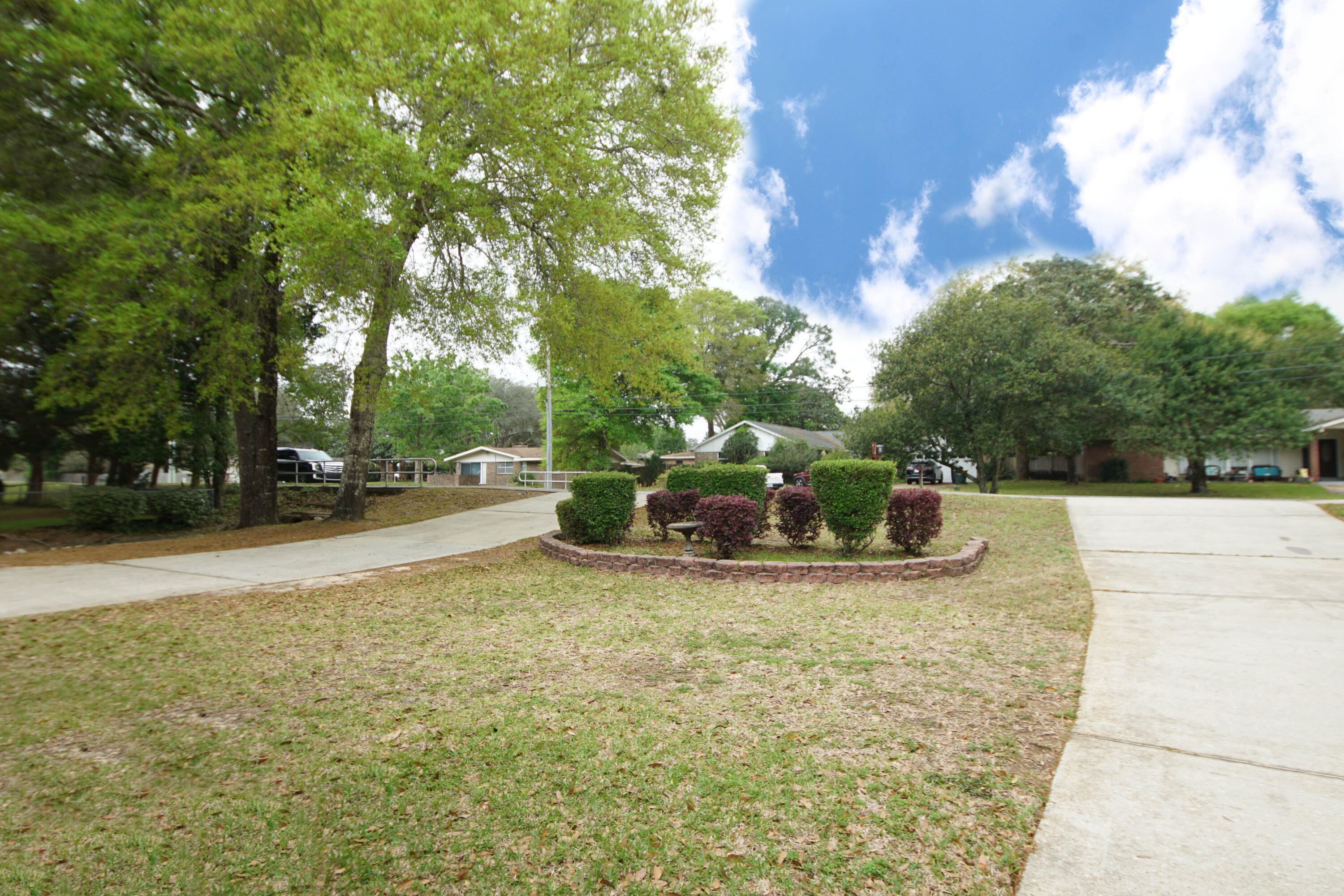 600 Northwest Mooney Road Fort Walton Beach, FL 32547 - Photo 5 of 35 a view of a house with swimming pool