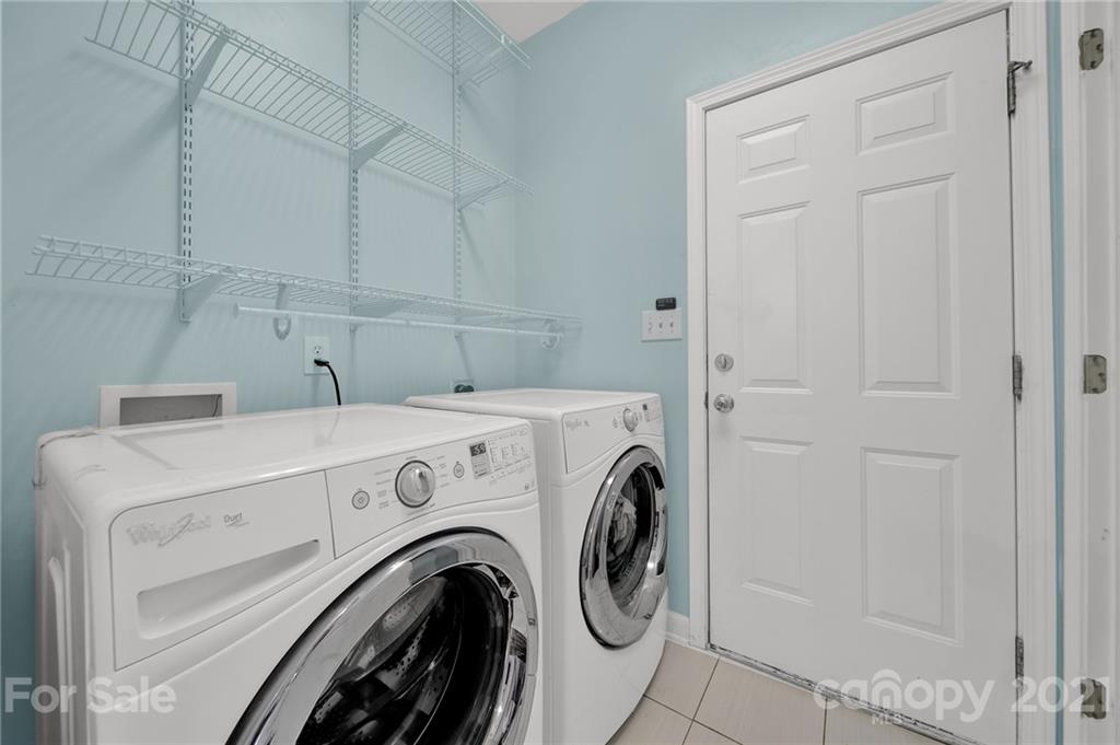 3307 Creek Trail Road Indian Trail, NC 28079 - Photo 29 of 43 a utility room with dryer and washer