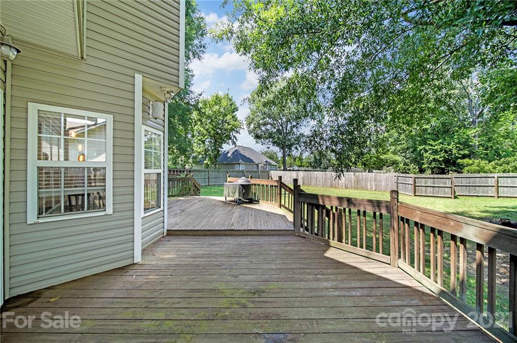 3307 Creek Trail Road Indian Trail, NC 28079 - Photo 30 of 43 a balcony with wooden floor and fence