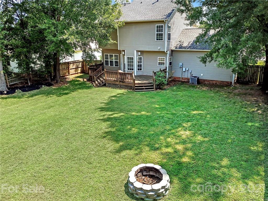 3307 Creek Trail Road Indian Trail, NC 28079 - Photo 34 of 43 a backyard of a house with seating space