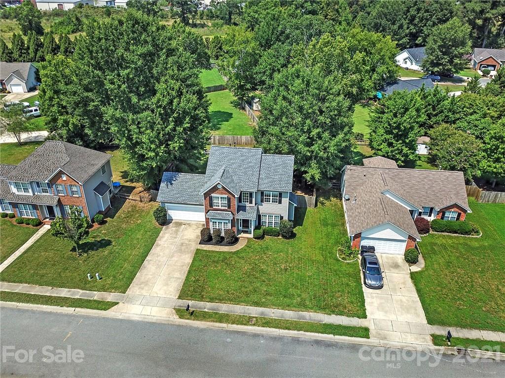 3307 Creek Trail Road Indian Trail, NC 28079 - Photo 40 of 43 an aerial view of a house with garden space and street view