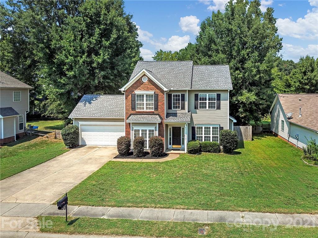 3307 Creek Trail Road Indian Trail, NC 28079 - Photo 42 of 43 a front view of a house with a yard and trees