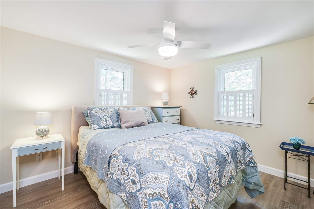 36 Sylvia Lane, Unit 36 Barnstable, MA 02632 - Photo 7 of 9 a bedroom with a bed and a window