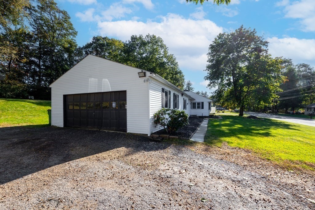 38 Ridge Street Westminster, MA 01473 - Photo 2 of 27 a front view of a house with yard and lake view