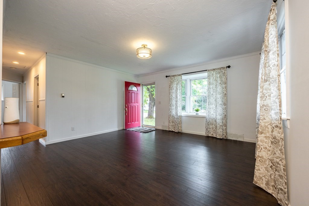 38 Ridge Street Westminster, MA 01473 - Photo 24 of 27 an empty room with wooden floor and windows